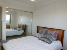 14/17 Lather Street Southport QLD 4215 Privately located at the rear of a secure building, the apartment opens to huge open plan kitchen, living and and family room; flowing onto a large covered outdoor entertainment area. The new kitchen features: New modern quality kitchen and range hood Large pantry Dishwasher Ample bench and cupboard space The open plan kitchen, living and dining areas are large enough for a family. Massive storage cupboard located near the entry. New air conditioning unit. Beautiful sea breezes naturally cool the entire apartment. The laundry boasts good space and generous storage cupboards