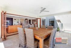 11 Wake Court Birtinya Qld 4575 Introducing 11 Wake Court, a substantial dual living waterfront residence located in the thriving, master planned community of Birtinya Island. Birtinya is home to the new Sunshine Coasts University Hospital, a premium world-class health hub which is stimulating growth and attracting investors and high net worth individuals both locally and overseas. It is also a location that is close too a variety of commercial, education and shopping facilities that is underpinning strong employment prospects and prosperity. This unique home offering genuine dual residency is set in a quiet street surrounded by other quality new homes. Completed in December 2012 it presents like new perhaps even better when you consider the upgrades and additional expense that has been put into finishing off the home. The design embraces an open feel and promotes a relaxed sub tropical lifestyle available on the Sunshine Coast. From the street the property presents as one large residence but is in fact two, the larger is a spacious 4 bedroom family home and the secondary a beautifully appointed self contained 2 bedroom house. Practical layout and smart design means you could use the entire residence as one extensive six bedroom family home or separately to accommodating two families under the same roof. The main dwelling comprises four double bedrooms plus study, music room or workshop, three separate living zones (two down and one up), big gourmet style kitchen & butlers pantry with quality cabinetry, stone bench tops, quality fixtures, fittings and appliances. There is an internal laundry with storage and work bench and a big double garage with remote access. The wide timber Bi-Fold doors are a major feature and lead directly from the family living room providing a seamless transition to the out doors. Here you will find a generous undercover outdoor room complemented by canal views and striking in ground pool. Another attractive feature of the home is the court yard conveniently tucked away off the media which provides a peaceful environment in which to take some quiet time. Natural textures and earthy tones are a prominent feature of this home both internally & externally and integrate to provide a contemporary stylish residence. The second property is connected via a single internal entry door which can be locked for privacy or left open to provide internal access. There is an external door if you want to access independently from the outside. On the ground floor you will find a double bedroom with two way bathroom, laundry facilities, open plan living with combined luxury kitchen. Bi-Fold timber doors lead out from the living onto your own private patio overlooking the water. Upstairs you will find a elegant master bedroom suit with viewing balcony, luxury ensuit and liberal walk in robe. Both homes have fully ducted air conditioning plus ceiling fans that help maintain a comfortable environment all year round. The high ceilings and over sized doors also promote natural ventilation and filter light freely through-out the house. Some other notable features that add to the enjoyment of the home include the power generating Solar Panels, zoned security system, Ethernet connections to bedrooms and study for fast internet relay, additional sound deadening quilt insulation to music room, study and master bedroom. This is truly a magnificent dual occupancy residence perhaps the best I have seen for some time. To appreciate just how unique an opportunity this is come along and inspect at our next open or if you prefer, via private viewing. All you need do is call James at Realway, we will be happy to show you around.