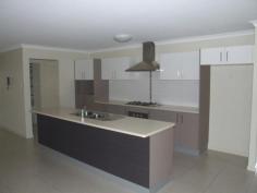 21 Grandview Parade Griffin QLD 4503 This near new lowset brick home is situated on a 580sqm block with room for side access. The unique floor plan offers 4 surprisingly large bedrooms and an extra large combined living, dining, kitchen area. The home is approximately 1.5 kms from Murrumba Downs shopping centre and Living Faith Lutheran school. *4 Bedrooms *Open plan living/dining kitchen *2 living areas *Air conditioning *Under roof alfresco *Double garage *Corner position - See more at: http://professionalsnorthlakes.com.au/real-estate/property/741649/for-sale/house/qld/griffin-4503/21-grandview-parade/#sthash.vFY3ufHi.dpuf