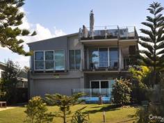 14 Esplanade Noosa North Shore Qld 4565 A rare opportunity presents itself to purchase an exclusive '40 Mile Beach' absolute beachfront home. Cooloola National Park envelops this exclusive beach house, which has stunning ocean views and is at the gateway to the World Heritage Teewah Coloured Sands and Double Island Point. Four-wheel-drive enthusiasts can escape the crowds via the Tewantin Car Ferry, and drive from the North Shore Tourist Park, along the beach for 10 mins 8km – you really will feel a million miles from anywhere! Investors seeking an ideal holiday escape can rest assured, leaving the city behind to enjoy the solitude of this architecturally designed residence. Winner of a prestigious Master Builders Association Award in 2007, this luxurious home presents as new, with no work to be done, just sit back and enjoy. Keeping in theme with its natural surroundings, beautiful timber floors and joinery complement a neutral palette throughout. Ample glass, including louvres, windows and sliding doors open to create an indoor/outdoor atmosphere, with loads of natural light and ventilation.