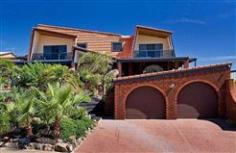 7 Grand Central Avenue Hallett Cove SA 5158 Huge family home built to captivate the magnificent sea view Architecturally designed, master built home offering 6 bedrooms (2 with ensuite), 3 bathrooms, 4 living areas including bar to rumpus room. This home also has a sparkling inground pool and spa plus a sauna. The impressive private entry with vaulted ceiling conceals the true size of this beauty. The upstairs can be completely self contained with a small kitchenette and there are architectural windows which pivot to open and let the beautiful sea breezes in. There is also ducted reverse cycle air conditioning throughout for year round comfort. The sparkling white kitchen is central to the downstairs and has a dishwasher and generous storage. This home would ideally suit a large or extended family with over 400sq metres of living to accommodate all members of the family. Inspection by appointment only so call Jayne Baily anytime on 0419 823 629 to arrange. General Features Property Type: House Bedrooms: 6 Bathrooms: 3 Building Size: 430.00 m² (46 squares) approx Land Size: 800 m² (approx) Outdoor Features Carport Spaces: 2 Garage Spaces: 3 Other Features Property Type: House