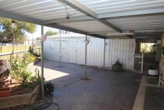 8 Cornwall St Berri SA 5343 $159,000
Enjoy the added security and comfort in this
solid home with roller shutters ducted evaporative air-conditioning,
Rinnai gas heater, Daikin split system plus the added bonus of solar
system and solar hot water system. The large lounge has two ceiling fans
to add to your comfort, good size master bedroom with built-in robe and
ceiling fan as well. Cupboard space is not an issue, as the kitchen is
larger than normal and well lit with a sky light. Outside offers a huge
10.7m x 6.7m under cover parking and a 6m x 9m shed with concrete floor,
power and light. Call today!
