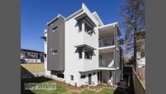 6-16/9 Haig Street Coorparoo QLD 4151 Convenience and Quality, Brand New Units in the Heart of Coorparoo Located in a brand new development in the heart of Coorparoo (only six remaining), these ultramodern three bedroom units are sure to impress. The $15K Great Start Grant makes it an extremely attractive prospect for new owner occupiers or an exciting investment opportunity, the choice is simple. Featuring quality finishes throughout you will be blown away by the level of style on offer at a price that cannot last! The open plan living and dining area features a choice of tile or wood laminate finish, split system air conditioning and flows to the spacious balcony. The sleek kitchen featuring Bosch appliances and stone bench tops is positioned to effortlessly service the lifestyle and entertaining areas. The spacious master bedroom features split system air conditioning, walk in wardrobe and ensuite. The second and third bedrooms all have built in wardrobes, ceiling fans and are serviced by the main bathroom. Additional features include intercom security; NBN wiring, LED down lights and single remote garage. The location is outstanding with amenities such as bus & train, quality schools, cafes & restaurants, Westfield Carindale, Greenslopes. General Features Property Type: Unit Bedrooms: 3 Bathrooms: 2 Indoor Features Air Conditioning Outdoor Features Garage Spaces: 1 Other Features Built-In Wardrobes,Close to Schools,Close to Shops,Secure Parking,Terrace/Balcony