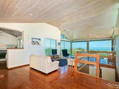 260 Esplanade Aldinga Beach SA 5173 What a perfect location overlooking Silver Sands Beach with views to the headland and beyond. Close
to a stairway that leads down onto the beach and to a walkway across
the sand dune to the sea. Also close to vehicle access and the Surf
Club.
Proudly positioned on a fabulous 1220 sqm block with a garden
designed to be low maintenance and to blend in with the vegetation of
the nearby Aldinga Scrub.
The upper level of this beautiful home features an open plan living
and dining area with a stunning vaulted ceiling and access to balconies
front and back. The kitchen is also on this level, along with two
bedrooms that both offer balcony access. Both have built-in wardrobes
and the large master suite includes a bathroom.
Two more bedrooms with built-ins are located downstairs, along with a combined laundry/bathroom.
A second spacious living room leads out to a paved and covered
entertaining area and then onto the delightful garden with seating areas
shaded by native trees.
Still referred to as "The Boat Shed", the lined and insulated
free-standing rumpus room is a real bonus when friends and family come
to visit. Fitted with cupboards, it makes an ideal spare bedroom and/or
games room.
The single garage under main roof has a panel lift door at each end.
Whether you are looking for a quality built holiday house or a
permanent residence along the Lower Esplanade, this is a "must see".