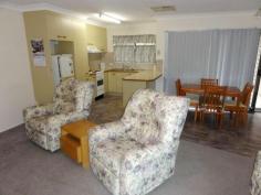 AFFORDABLY YOURS IN A GOOD LOCATION
Situated in a small unit community sits this attractive 2 bedroom
brick Unit with rear lane access. You will appreciate the reasonable
sized side and rear fenced yard with a stamp concrete pergola area to
relax on + lockup storage cupboard. The unit consists of single
carport with adjacent entertaining area, 2 good sized bedrooms both with
built-in robes, generous sized open plan kitchen / Dining and lounge
area. There are also a reverse cycle air-conditioner unit in the living
area + ducted evaporative air-conditioning. Ring now to book your private inspection.