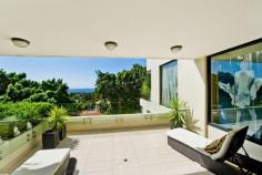 4/9 Banksia Road Bellevue Hill NSW 2023 Luxurious, Low Maintenance Living Occupying an entire floor with direct lift access is this modern apartment set back in the treetops. In a landmark central position with ocean and leafy views this sub penthouse offers total privacy and seamless living. The stylishly presented apartment features 3 bedrooms, all with built-ins and main with ensuite bathroom with spa and own balcony. Additional full bathroom with separate shower and spa bath as well as a guest W/C and internal laundry. - Chic CaesarStone gas kitchen with modern appliances - Spacious living areas leading to North facing entertainment balcony - Direct lift access from DLUG, alarm, security intercom, reverse cycle a/c - Ocean and district views, common solar heated pool General Features Property Type: Apartment Bedrooms: 3 Bathrooms: 2 Land Size: 175 m² (approx) Outdoor Features Garage Spaces: 2 Contact Agent