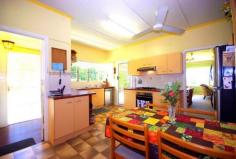 66 Nambour Mapleton Rd Nambour QLD 4560 $415,000 As much about the feel as the generous features... this immaculately presented mid-century chamfer clad timber home has been built to enjoy the environment and wonderful vista. Sunny and airy, with plenty of windows to enjoy both. Appealing and spacious kitchen with dishwasher. 3 bedrooms upstairs plus study space and 2 bathrooms. Downstairs self-contained storage basement that has been utilised for extra accommodation. The private & well established gardens are a real treat; with lily pond feature. Solar electricity and solar hot water systems. 4 air conditioners and dishwasher. Private outdoor entertainer's patio. Front carport with easy single-level access. Quality terracotta tile roof. Fenced corner block with dual entry for plenty of vehicle spaces or a caravan or boat. Garden shed. Amazing ocean views over town. Walk to hospital.