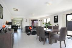 5 St James Street Hadfield VIC 3046 Nothing compares to the vast open spaces and quality finishes of new
design as showcased in this immediately appealing three bedroom family
residence. Still under builder's warranty, this handsome
double-fronted brick home boasts three enormous, flexible living zones
including a huge formal front lounge, vast, sundrenched
kitchen/meals/dining and rear family room spilling onto a covered
alfresco area with cafe blinds for year round entertaining. The
contemporary kitchen features Fisher & Paykel dishwasher, electric
wall oven with separate grill, 90cm gas glass cooktop with wok burner
and stylish stainless steel canopy rangehood. The centre island includes breakfast bar whilst the large double door pantry offers great storage.
Accommodation is generous with three spacious bedrooms serviced by a
stylish central bathroom, large ensuite and separate toilet. All are
fitted with built-in robes, king sized master with walk-in robe.
Off-street parking is plentiful with a double remote garage including
second roller door for rear exit, extending the driveway to accommodate
several vehicles. The low maintenance backyard offers extended
entertaining and/or secluded parking. Also with separate laundry, ducted
heating, evaporative cooling, landscaped gardens and ample storage.
Ideally located close to schools and public transport in a
family-friendly neighbourhood, the home offers a contemporary,
convenient lifestyle! For Due Diligence Checklist - see Consumer Affair Website - www.consumer.vic.gov.au/duediligencechecklist