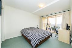 73/13 Chandler Street Belconnen ACT 2617 Live the High Life This simply gorgeous upper floor apartment in the heart of Belconnen's town centre offers an executive lifestyle with encompassing views over Lake Ginninderra and surrounds to match.The spacious three bedroom ensuite apartment also features a large north-facing balcony (approx. 24m2) that extends your living outdoors and provides the perfect lake-viewing platform. Inside, the generous lounge and dining areas are light and airy and offer plenty of room for your lifestyle activities - a study nook, weights corner or sewing table will fit in easily here and still leave plenty of comfortable space for an 8-seater dining table and lounge furniture. The fully-equipped kitchen opens to the living areas and has views to cook by. All the bedrooms are generous and would comfortably accommodate a work station or toy cupboard alongside the bedroom furniture. The segregated main bedroom, with large ensuite, also opens to the balcony and offers lake views. The main bathroom, with spa bath, incorporates a European-style laundry with tumble dryer and the 6-star EER rating ensures the apartment is comfortable all year round. New carpet has just been laid throughout.Awash with natural light. General Features Property Type: Apartment Bedrooms: 3 Bathrooms: 2 Building Size: 96.00 m² (10 squares) approx Land Size: 0.64ha (1.57 acres) (approx) Indoor Features Ensuite: 1 Outdoor Features Garage Spaces: 2 Eco Friendly Features EER (Energy Efficiency Rating): Medium (6.0) $430,000