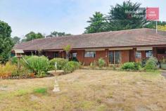 35 Progress Road Silvan VIC 3795 Spacious Home on 10 Acres Useable, flat & fenced 10 acres of prime land with an excellent solid brick family residence. The home offers accommodation of four bedrooms, master with ensuite, and spacious living areas including kitchen/meals, family room, lounge with wood heater and separate formal dining room. Comforts include integrated ducted heating/airconditioning as well as two gas wall furnaces. There is also a double garage plus workshop & storeroom and a huge, full length, covered rear verandah. The property is set amongst other acreage properties in this idealic, semi-rural location. The 10 acres are completely useable and fully fenced with three separate large paddocks and a huge dam. Ideal, fertile land for farming or horse property or simply lifestyle living with the privacy & seclusion acreage properties can offer. Only 10 mins from Lilydale, easy access to Eastern suburbs and less than an hours drive to the city. General Features Property Type: Acreage/Semi-Rural Bedrooms: 4 Bathrooms: 2 Land Size: 4.05ha (10.00 acres) (approx) Indoor Features Ensuite: 1 Built-in Wardrobes Dishwasher Ducted Heating Ducted Cooling Air Conditioning Outdoor Features Carport Spaces: 2 Garage Spaces: 2 Other Features Storage room, wood heater