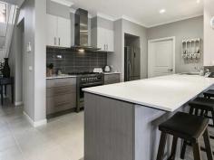 94 Arnolds Creek Blvd Melton West VIC 3337 Easily Cater for Large-Family Living This magnificently designed & built Porter Davis home comprises a mixture of formal & entertaining areas throughout. Downstairs is the first master bedroom inclusive of full ensuite, his & hers walk-in robes & parents retreat. The generous sized kitchen is complete with caesarstone bench tops, butlers pantry & Blanco stainless steel appliances. The purpose built home theatre & adjoining dining & family areas lead out to the alfresco living, overlooking the monster size solar heated swimming pool & manicured gardens. Upstairs offers a formal lounge, home office & 3 bedrooms, including a second master with full ensuite & walk in robe, the 3rd bedroom contains its own walk-in robe & direct access to the two-way master bathroom. The home office's balcony takes in stunning views of the Long Forest Flora and Fauna Reserve & Lederderg State Park. Ceiling fans are located in all 4 bedrooms & ducted heating & cooling provides great climate control all year round. Only the best fixtures & fittings have been used throughout this outstanding home in a highly sought after estate. An inspection will not disappoint, book an inspection today. General Features Property Type: House Bedrooms: 4 Bathrooms: 3 Indoor Features Ensuite: 2 Outdoor Features Garage Spaces: 2