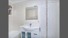16/25a Mill Street Goodna QLD 4300 Investors Dream ! ! ! - Add This To Your Portfolio Newly and very tastefully renovated, this very large, 3 Bedroom Unit, has it all! You will see the quality as soon as you walk through the door! The décor throughout, is very neutral, and offers an extremely welcoming environment immediately. Currently rented at $300 per week! With long lease in place. How is that for a great investment opportunity?? This tenant would ideally love to stay too, so from an investment point of view, this makes it an absolute no brainer for fantastic income! Gorgeous shiny porcelain tiles lead you through the entry and around to the kitchen. This kitchen is designed for the most fastidious chef. Offering lovely gas stove, dishwasher, double sink and huge fridge space. With a gorgeous long, black bench-top, overlooking the extra-large living-room, and loads of cupboards and drawer space too! Ivory coloured, 2 pack cupboards and drawers make cleaning a breeze, and they look absolutely stunning! Having all floors throughout the living area and bedrooms fully tiled, this offers a lot of extra light, and looks just beautiful! There are ceiling fans throughout this lovely General Features Property Type: House Bedrooms: 3 Bathrooms: 1 Land Size: 161 m² (approx) Indoor Features Toilets: 1 Air Conditioning Outdoor Features Garage Spaces: 1 Open Car Spaces: 1 Other Features Built-In Wardrobes,Close to Schools,Close to Shops,Close to Transport