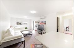 62/75 Elizabeth Jolley Crescent 'Mosaic' Franklin ACT 2913 $339,000 On the ground floor of the excellent Mosaic complex and within easy walking distance to the ever growing Gungahlin marketplace this could be the funkiest and best value apartment on the market in this location right now! The moment you walk inside this great property the abundance of space and light is evident. Large open plan living is the theme here. Big windows and high ceilings all surround the modern contemporary kitchen and lead out to the large secure courtyard that looks out to the trees! Outstanding! Read more at http://kaleen.ljhooker.com.au/S3AF9Q#RxeZ1oifcB5LFjcL.99