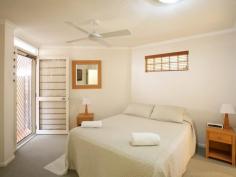 2 Park Crescent Sunshine Beach QLD 4567 $525,000 (Property no. 583) Please contact us about this property Salespersons: Pip Covell (0418 714 744) Park Shores Sunshine holiday apartments enjoy an open corner position only a hundred metres or so to the beach access and a short stroll around the curve of the beachfront avenue to the village shops, a dazzling array of restaurants and the much loved Surf Lifesaving Club. A walk to everything location and added security of a year round patrolled surf beach are right on the top of the wish list of holidaymakers. A wrought iron intercom security gate links the pool and a terracotta roofed barbecue pavilion where you can prepare a feast with a watchful eye on the youngsters. The attractive rendered block building has breakaway curved balconies and planter boxes lining upper level windows. Number three sits in the centre of the building just above the gardens, with easy elevator access from under building allocated parking and a central staircase to the front door. A very handy walled courtyard off the main ensuited bedroom is a great place to store the gear after a morning on the beach and perfect for some large potted specimens. The onsite manager keeps the complex in great shape while happily attending to the needs of visitors and guests. This first floor holiday unit basks in a wonderful north eastern aspect across the tropically prepared grounds, open pool terrace and garden pavilion. The balcony easily accommodates a six seat table and if you crane to the sea there is a patch of blue ocean. An open living room edges a window edge kitchen equipped with a Meile induction hot plate and twin burner gas hob. A nook off the entry caters for extra gear and computers. Laundry facilities and a main bathroom sit down a short hallway and the main bedroom links with the rear courtyard. Convenience, a wonderful north eastern balcony to while away an afternoon and a short hop step and jump into the sea. Features: air-conditioned, ceiling fans, computer nook, north eastern balcony, little ocean view, ensuite main bedroom, laundry facilities, parking bay, storeroom, booking office, fully furnished for immediate holiday bookings, pool, walk to beach and village
