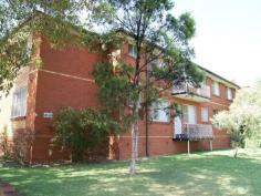 2/26-28 Seventh Ave Campsie NSW 2194 This is a truly rare find appealing to investors and unit buyers is this spacious ground floor unit located in a quiet complex close to station and shops. Features include: * 2 bedroom plus study * Eat in kitchen * Timber floors * Built in wardrobes * 2 toilets * Internal laundry * Balcony * Registered carspace Total area 86m2 approx For Sale: Offers Above $450,000