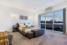 93 Carrington Road Box Hill VIC 3128 Young, Private & Supremely Convenient Families, professionals and investors, would you love a young 2-storey residence in the heart of Box Hill that's contemporary, easy and private? It's just a short walk (about 300 metres) to Box Hill Centro, restaurants and station, yet this stunning 4 bedroom 2 bathroom home is so secluded. Quietly tucked away at the end of a long driveway, you will instantly be impressed by the rendered facade and attractive, easy-care landscaped gardens. Three car accommodation makes parking a breeze and includes an internal access remote double garage and a carport. Stylish, light and beautifully appointed, upstairs you'll discover 4 double bedrooms (BIRs) and a family bathroom. The spacious restful master boasts WIR, split system and spa bath ensuite with double vanity. Two large living areas and a black granite kitchen featuring quality appliances give you space and practicality to relax and entertain. The formal lounge/dining room is highlighted by gorgeous hardwood polished floors, while the sun-filled family/meals room opens to the private covered deck and low-maintenance landscaped garden with a cubby house; for year-round enjoyment. Additional highlights: powder room, ducted heating. General Features Property Type: House Bedrooms: 4 Bathrooms: 2 Outdoor Features Carport Spaces: 1 Garage Spaces: 2