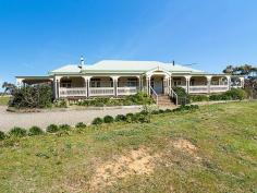 104 Rymill Road Ashbourne SA 5157 $3,600,000
"Pholi Farm" near Ashbourne is one of the larger properties within the
Hills and Fleurieu region in one parcel of land. The property comes with
10 sections on 9 certificates of title in a very secure rainfall area.
The Finniss River flows from west to east through 3kms of the property. A
magnificent Queenslander style executive class homestead was built in
1998 and has 4 bedrooms, a large living area and 3.3m timber verandah
deck with views over the valley. Shedding includes a 5 bay garage
and workshop plus machinery shed and shearing shed with sheep yards.
There are 2 sets of cattle yards, 14 dams and good fencing. A 5 acre
Chardonnay vineyard along the entrance to the homestead is watered from
the Finniss River. The property is currently run as a cattle operation
and would equally suit sheep and lamb production. Information Memorandum available at request.
