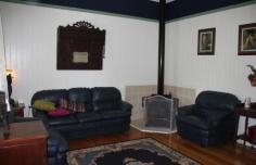 17 William St Millmerran QLD 4357 DETAILS $315,000 Residential Bedrooms: 4 Bathrooms: 2 Garage Spaces: 1 1st Time Opportunity—”The Post Office House” Available For Separate Sale – $315 000 Area: 1010 Square Metres – Renovated Queenslander with character and charm, 4 Bedroom timber home, all b/rs with ceiling fans & built-in storage, main b/r has ensuite & opens onto verandah, 2nd b/r has large w.i.r.. Large formal lounge room with fire place & ceiling fan, stylish main bathroom with shower over bath, toilet & vanity, wide hallway, wide polished original timber floorboards throughout, office, laundry with plenty of storage space, front verandah with northern aspect, single garage, under cover outdoor living area, cubby house, garden shed, established gardens, fenced yard. Only minutes to walk to the Main Street & all town amenities. Backyard access to Bowls Club
