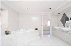 7 Grand Central Avenue Hallett Cove SA 5158 Huge family home built to captivate the magnificent sea view Architecturally designed, master built home offering 6 bedrooms (2 with ensuite), 3 bathrooms, 4 living areas including bar to rumpus room. This home also has a sparkling inground pool and spa plus a sauna. The impressive private entry with vaulted ceiling conceals the true size of this beauty. The upstairs can be completely self contained with a small kitchenette and there are architectural windows which pivot to open and let the beautiful sea breezes in. There is also ducted reverse cycle air conditioning throughout for year round comfort. The sparkling white kitchen is central to the downstairs and has a dishwasher and generous storage. This home would ideally suit a large or extended family with over 400sq metres of living to accommodate all members of the family. Inspection by appointment only so call Jayne Baily anytime on 0419 823 629 to arrange. General Features Property Type: House Bedrooms: 6 Bathrooms: 3 Building Size: 430.00 m² (46 squares) approx Land Size: 800 m² (approx) Outdoor Features Carport Spaces: 2 Garage Spaces: 3 Other Features Property Type: House