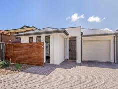 66A Wallala Avenue Park Holme SA 5043 $415,000 - $430,000 ARE YOU LOOKING TO DOWNSIZE OR A FIRST HOME BUYER? • VIRTUALLY BRAND NEW - ONLY 14 MONTHS OLD • FEATURES 3 BEDROOMS • MASTER BEDROOM WITH ENSUITE AND WALK IN ROBE • BEDROOMS 2 & 3 WITH BUILT IN ROBES • MODERN MAIN BATHROOM WITH BATH • LARGE OPEN PLAN KITCHEN/DINING AND LOUNGE AREA • PLENTY OF CUPBOARD AND BENCH SPACE IN THE KITCHEN • GAS HOT PLATES AND WALL OVEN, PLUS DISHWASHER • DOUBLE SLIDING DOORS OPEN ONTO ENTERTAINING AREA • SEPARATE LAUNDRY WITH LINEN AND BROOM CUPBOARD • SECURE ONE CAR GARAGE WITH SPARE SPACE FOR ANOTHER VEHICLE • 5 MINUTES TO TRAIN & TRAM • 10 MINUTES TO FLINDERS MEDICAL CENTRE • CLOSE TO MARION & PARK HOLME SHOPPING CENTRES DON'T MISS THIS OPPORTUNITY!!!