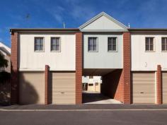 9 Birch Lane Kensington VIC 3031 Urban Living at its best - FORTHCOMING AUCTION Ideally located in the heart of trendy Kensington is this modern one bedroom, two storey town residence with lockup garage. The floor plan is cleverly broken into two distinct components over the two storeys. Upstairs, the first floor boasts generous accommodation in modern neutral tones, whilst the ground level caters for storage and off street parking. The living design is open plan and comprises space for lounge and dining upon polished timber floors, adjoining a neat, kitchen which includes dishwasher, stand alone cooker and good cabinet space. A large, carpeted double bedroom is fitted with excellent built in robes, as well as a linen cabinet providing further storage options. The spacious ensuite with overhead shower in the bath, toilet and vanity also incorporates functional laundry facilities. Dual layer roller blinds throughout, and reverse cycle air conditioning ensure comfort in all seasons. The lockup remote single garage offers secure off street parking for one vehicle with immediate access to the home. A convenient storage room is located beside. Well located in a quiet street, just minutes from the CBD. General Features Property Type: Townhouse Bedrooms: 1 Bathrooms: 1 Outdoor Features Garage Spaces: 1