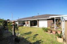 9 Oval Dr Shoalhaven Heads NSW 2535 If you are looking for a fantastic family home then this is for you.. Located on a corner block this home consists of 3 bedrooms all with built-ins, large sun room, games room, full solar power, single garage with separate shower and toilet and workshop, complete with auto roller doors and drive-thru access to the fully fenced back yard Open plan kitchen / dining area that flows through to the lounge room which has air conditioning and a wood fire to keep warm on those winter days. Walking distance to the bowling club, golf club, soccer oval, doctors, shops and the river. FOR SALE: Offers Above $445,000