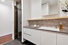G4/26-38 Merri Parade Northcote VIC 3070 Designer Living In Wonderful Westgarth Embrace the exciting and refreshing lifestyle this brand new one bedroom apartment invites you to enjoy in the fashionable "Parade," opposite Merri Creek trail. Featuring inspired floor-to-ceiling glass aspects to a stylish northerly courtyard from the open kitchen/meals/living areas, which also offers a terrific study nook. The home boasts superior fittings throughout. The kitchen has elegant stone surfaces, a full suite of stainless steel Miele kitchen appliances, mirrored built-in robe, chic bathroom with European laundry, video intercom, reverse cycle split system heating/cooling and secure parking with storage cage, so you can live it up in style. On the North Fitzroy fringe, trains and trams are a short stroll away, as is lively Westgarth Village, with its cinema, trendy cafes and shops, and the city's heart just minutes away. General Features Property Type: Apartment Bedrooms: 1 Bathrooms: 1 Indoor Features Toilets: 1 Study Outdoor Features Garage Spaces: 1