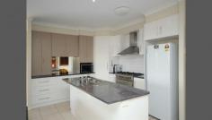 16 Howard Street Middle Ridge QLD 4350 The Modern, The Comfort, The Luxury This large family home features a perfect balance of style, space and location. Featuring a neutral colour palate and a well designed flowing floor plan. This is a space you will be happy to come home to. The centrally located modern open plan kitchen is perfectly positioned spilling into a large lounge/dining area, offering spectacular views to the city. - Family media room - 9ft ceilings - All bedrooms have built ins - Master bedroom features ensuite & walk in robe - Covered entertaining area - Landscaped gardens - Close to parks & shops General Features Property Type: House Bedrooms: 4 Bathrooms: 2 Land Size: 759 m² (approx) Price per m²: $867 Indoor Features Toilets: 2 Air Conditioning Outdoor Features Garage Spaces: 2 Other Features Built-In Wardrobes,Close to Shops,Secure Parking,Formal Lounge,Family room , Office , Spa bath