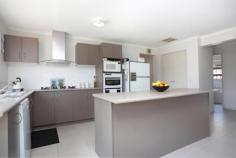 5 St James Street Hadfield VIC 3046 Nothing compares to the vast open spaces and quality finishes of new
design as showcased in this immediately appealing three bedroom family
residence. Still under builder's warranty, this handsome
double-fronted brick home boasts three enormous, flexible living zones
including a huge formal front lounge, vast, sundrenched
kitchen/meals/dining and rear family room spilling onto a covered
alfresco area with cafe blinds for year round entertaining. The
contemporary kitchen features Fisher & Paykel dishwasher, electric
wall oven with separate grill, 90cm gas glass cooktop with wok burner
and stylish stainless steel canopy rangehood. The centre island includes breakfast bar whilst the large double door pantry offers great storage.
Accommodation is generous with three spacious bedrooms serviced by a
stylish central bathroom, large ensuite and separate toilet. All are
fitted with built-in robes, king sized master with walk-in robe.
Off-street parking is plentiful with a double remote garage including
second roller door for rear exit, extending the driveway to accommodate
several vehicles. The low maintenance backyard offers extended
entertaining and/or secluded parking. Also with separate laundry, ducted
heating, evaporative cooling, landscaped gardens and ample storage.
Ideally located close to schools and public transport in a
family-friendly neighbourhood, the home offers a contemporary,
convenient lifestyle! For Due Diligence Checklist - see Consumer Affair Website - www.consumer.vic.gov.au/duediligencechecklist