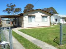 41 GEORGE STREET MARULAN NSW 2579 * Three bedrooms, all with BIR's * Lounge room with gas flued heater * Meals area with R/C A/C * Kitchen with gas cooking and rangehood * Double garage with poser and carport * Level 835sqm fenced block * Construction - Hardiplank and iron roof * Walk to shops, schools, tansport