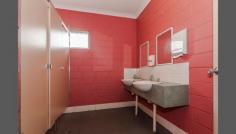 8 Beardsley St Port Kennedy WA 6172 SPORTS OR OTHER USES..!! Outstanding opportunity to own this massive 1032m2 building situated on a huge 2420m2 block, zoned light industrial with current use as an Indoor Sports centre, inc a reception/foyer, canteen, office, male & female change rooms, showers & W/C's plus an activity/rec room. Plenty of parking available as well. This property is available with or without its current use/business, plant & equipment. Well established centrally located within the Port Kennedy business centre.