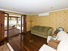 22 Crayden Rd Kalamunda WA 6076 This home is a celebration of country
charm with its delightful palette of colour and pattern, polished
floorboards and French doors opening onto an impressive timber deck with
leafy green views of the nearby wooded reserve. Big shady trees grace
the backyard canvas with a white-washed pergola and an undercover
archway at the side of the house.
You'll love cooking a hearty meal in the farm-house style kitchen,
sharing stories with family and friends in the dining/sitting room,
relaxing in the cosy lounge room and waking up to birdsong in the two
generously-sized bedrooms. Enjoy wandering down to the farmers market in
Kalamunda Village on Sundays or the local craft/produce markets held on
the first Saturday of every month.
There is nothing ordinary about this house. It truly is a home that will find a place in your heart!
Ring Belinda today on 0438 545 880 to organise a visit.
Features:
* Large 822 sqm block with established trees and room to create/extend
* Corner block with convenient side double-gate vehicle access
* 1/4 acre wooded reserve adjacent to property
* Close to schools, parks, ovals and bus stops
* Short walk to Kalamunda Village shopping precinct
* Master bedroom with mirrored built-in-robes
* Generous-sized second bedroom
* Quality Roman blinds and curtains
* Phantom flyscreens for bedroom and kitchen windows
* Kitchen with recycled pine bench tops, plate rack, drawer dishwasher, stainless steel gas hob and rangehood
* French doors opening onto expansive hardwood timber deck with LED downlights
* Laundry featuring cabinetry with pull-out ironing board and cupboard for front-load washing machine
* Reverse cycle A/C unit in the open plan kitchen/dining
* Ducted evaporative airconditioning throughout
* Stylish stainless steel mesh security screen doors
* Security alarm system
* Single car garage with storage space
* Garden shed
Read more at http://highwycombe.ljhooker.com.au/NDZGD0#S2EPPdl6XcTqDslp.99