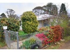 9 Whinmoor St Katoomba NSW 2780 Situated
on an old established verdant garden with spectacular shows of colour
throughout the year and a total area of approx. 670m2. Hidden behind a
beautiful Sasanqua Camilla hedge, is this three bedroom 1960’s fibro and
iron home in original condition and comprising of covered front patio,
lounge room, dining area, small kitchen, bathroom and… - See more at:
http://www.theopoulos.com/listings/?type=residential&subtype=residential#sthash.4KPXSEUy.dpuf Situated on an old established verdant garden with spectacular shows of colour throughout the year and a total area of approx. 670m2. Hidden behind a beautiful Sasanqua Camilla hedge, is this three bedroom 1960’s fibro and iron home in original condition and comprising of covered front patio, lounge room, dining area, small kitchen, bathroom and…