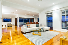 29 Tooth Ave Paddington QLD 4064 Magnificent residence on 1447m2 - 3 lots - in the heart of Paddo! Positioned in the heart of Paddington on 3 allotments with the 3rd unencumbered this Queenslander, magnificent by design, offers you the ultimate lifestyle in a blue chip position complete with swimming pool and even room to complete the picture with a tennis court. Set over two levels, basking in a sought after north-eastern light with panoramic views to the city and surrounding Paddington district, the elevated stance invites balmy breezes in all year round. Entry level * Expansive open plan formal living and dining spills out to entertainers deck overlooking the sparkling pool and breathtaking views * Gourmet kitchen with feature island bench, beautiful stone bench tops, soft close cabinetry; abundant storage and work space an Epicurean's delight * Family meals area * Luxurious parents retreat with feature bay window, lounge/study area, walk-in dressing room and indulgent ensuite * 2nd bedroom with built-in cupboards is conveniently position to the guest bathroom * 6th bedroom/Nursery or home study * Utility room in close proximity to the kitchen Descending internal timber staircase * Family living / rumpus area centrally located to the bedrooms on this level flows out to deck and swimming pool * Three huge bedrooms, all with built-in cupboard * Large family bathroom * Laundry with linen storage * Under-stair storage perfect place to store your wine collection * Internal access from double remote control garage Features * Substantial family home in blue chip position on 1447m2; a once in a lifetime opportunity for you to make this your family's heritage * Build the tennis court, or hold the lot and reap the rewards years on * Queenslander character features perfectly infused with contemporary design * Soaring ceilings, polished timber floors, warm welcoming neutral palette * Ducted reverse cycle air-conditioning, alarm system * Easy-care landscaped surrounds with plenty of space for back-yard cricket by the pool * Fully fenced with remote control vehicle access and keyed pedestrian gate. On the doorstep of Paddington's renowned cafe and boutique shopping precincts, you will find Rosalie village, Suncorp Stadium and the City centre in close proximity. Perfectly positioned to highly regarded private and public schools. 29 Tooth Avenue offers you a rare opportunity to secure your family's future today and appreciate a sought-after lifestyle of relaxed sophistication in the heart of Paddington. Please call Rachael Spinks on 0411 10 10 15 or (07) 3368 1298 to arrange a viewing