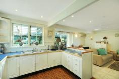 Faulconbridge, NSW 2776 For those purchasers out there looking for an individual home in a great
neighbourhood, that’s handy to all public amenities – well look no
further. This full brick and timber home constructed in the 1980’s sits
up high and enjoys sweeping views towards the Sydney basin. Imagine
sitting out on the verandah watching the twinkling lights during the
evening or sitting back with a cup of tea and watching the morning sun
rise? The home features three bedrooms, each with built in robes, an
ensuite, plus a commodious main bathroom with a statement claw foot
bath and timber lined walls. There is a central living room area, from
which the kitchen, laundry and covered patio adjoin. The kitchen has
been renovated and provides new appliances, and plenty of storage. The
large covered patio is reached through French doors to the rear of the
home. This shady area and the gazebo are ideal spots for entertaining
and relaxing with a quiet weekend meal. At the rear and side of the
home, the lawns and gardens provide a private space that family and
friends are sure to enjoy. A concrete driveway provides access to the
separate garage at the rear of the yard. There is a secure store space
under the house and garden shed for extra bits and pieces. The garage,
cellar & gazebo are fully powered with lighting and power outlets
This high side location is ideal for the active family with schools
,Aquatic centre, National Park, ovals, and bus stop, all less than one
km away. The sloping garden block size is 1,010 m² in area.
