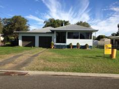 8 Railway Parade Injune QLD 4454 $270,000 Neg. Lowset 3 bedroom home in a thriving small town.Open Plan living area opening onto front verandah. Lounge has reverse cycle air-conditioning, fan & wood heater. Kitchen has electric stove, dishwasher & rangewood. Main bedroom is carpeted, built-ins and ceiling fan. Main bathroom has shower, toilet and another separate toilet. Laundry with linen cupboards. Access to 2 car garage from house! Side verandah with ramp. Huge outdoor area at rear of house with established gardens and palm trees. House is connected to 2 x 13600 Rain Water tanks as well as town water. 8x8 metre steel shed with cemented floors at rear of house with single three phase power. Tenure Type: Leasehold $800 yearly. Read more at http://roma.ljhooker.com.au/C8HG2#21cyxwuFbI1Flcbi.99