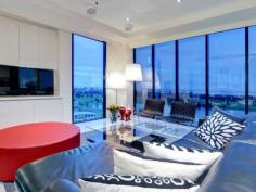 1606/582 St Kilda Road Melbourne Vic 3004 When you live at Aurora, you will be a few
steps away from Wesley College - one of Melbourne's most prestigious
schools. And living at Aurora will also be about style, convenience and
safety. Residents enjoy 24 hour security and the ability to welcome
visitors on video intercom.
If you work in the city, then living in St. Kilda Road will enable you
to take a short tram trip to work, so rather than sitting in traffic,
spend time in the resort style facilities including pool, sauna and gym
at the beginning or end of your day.
Enjoy floor to ceiling views of the CBD, Albert Park Lake and Port
Phillip Bay, or go out and enjoy the St Kilda nightlife and not have to
get a taxi home.Imagine waking up every day to this endless view. Light
and Luxury surrounds you.
Be captivated by this 16th floor apartment, recently renovated from the
shell up, which can only be described as excellence beyond excellence.
From the moment you enter the front foyer of the apartment you will
appreciate the quality of the work that has been lovingly completed,
with full attention to every detail.
Comprising of two generous bedrooms and a second living zone which can
be converted to a third bedroom if the need arises. Large open plan
formal living and dining area with galley style kitchen all with the
latest appliances from Miele including induction cooker,
microwave/convection oven and food warmer. The master bedroom with a
full ensuite and WIR will be the envy of all your friends. Integrated
home office, plus custom cabinetry to incorporate all audio visual
requirements throughout .Separate full laundry. All rooms enjoy the
latest technology SONOS audio system wired to a main computer for
individual internet access with separate volume controls to each room.
The lounge area incorporates a separate surround sound home theatre with
projector and electronic drop down screen linked to an entertainment
processing unit with PC capabilities. Other special features include
imported Italian fixtures, porcelain tiles throughout, remote control
blinds. Two car spaces and storage cage are included.
This apartment is available for sale with all the professionally chosen
high quality furniture included or sold with vacant possession.
Call for details and arrange inspection.
Read more at http://cityresmelbourne.ljhooker.com.au/N5HC2#tIVCgiGulMSosUby.99