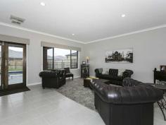 94 Arnolds Creek Blvd Melton West VIC 3337 Easily Cater for Large-Family Living This magnificently designed & built Porter Davis home comprises a mixture of formal & entertaining areas throughout. Downstairs is the first master bedroom inclusive of full ensuite, his & hers walk-in robes & parents retreat. The generous sized kitchen is complete with caesarstone bench tops, butlers pantry & Blanco stainless steel appliances. The purpose built home theatre & adjoining dining & family areas lead out to the alfresco living, overlooking the monster size solar heated swimming pool & manicured gardens. Upstairs offers a formal lounge, home office & 3 bedrooms, including a second master with full ensuite & walk in robe, the 3rd bedroom contains its own walk-in robe & direct access to the two-way master bathroom. The home office's balcony takes in stunning views of the Long Forest Flora and Fauna Reserve & Lederderg State Park. Ceiling fans are located in all 4 bedrooms & ducted heating & cooling provides great climate control all year round. Only the best fixtures & fittings have been used throughout this outstanding home in a highly sought after estate. An inspection will not disappoint, book an inspection today. General Features Property Type: House Bedrooms: 4 Bathrooms: 3 Indoor Features Ensuite: 2 Outdoor Features Garage Spaces: 2