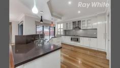 4 Trudi Ct Bundoora VIC 3083 SALE BY NOMINATED DAY TUESDAY THE 18TH OF NOVEMBER 7.00 PM UNLESS SOLD PRIOR Custom built and leaving nothing to spare, this grand residence in the prestigious Lancaster Gate Estate will leave you speechless. Be greeted with the light filled entrance that guides to a lavish theatre room with surround sound, bar to help settle in for a night with friends and family. The heart of the home offers further grandeur with a stunning 2 pack kitchen that boasts granite bench tops & glass splash back, 900mm Blanco oven, dishwasher and a butler's pantry. The open meals and living area add further glamour with the size on offer along with a grand fireplace while looking out to one of the finest fully landscaped backyards ever offered. The stacker doors guide you through to a purpose built BBQ area, and enough space to entertain the neighbourhood. The sweeping staircase leads to the upper level which boasts quality carpet flooring and offers 4 bedrooms with WIR, separate bathroom and master with stunning ensuite that has his/hers basins, grand spa and huge shower, bidet and a huge WIR/dressing room. Further quality fixtures and fittings include quality timber flooring, high ceilings with decorative cornice, decorative doors, high end window furnishings, down lights, zoned ducted heating, evaporative cooling, alarm, video intercom, surround sound throughout, 2 car remote garage and more. Certainly one of the finest homes offered in the suburb and within arm's length of Latrobe University, new Polaris shopping precinct, schools, and transport, you'll be hard pressed to find a more impressive home.