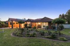 1 Hyde Park Walk Mooroolbark VIC 3138 This clinker home is in a superb location set on a large 865sqm block that would be the envy of many. Close to the train station, bulk bill clinic, shops, churches and schools (Catholic, pre-schools and Billanook private school), basically everything at your fingertips being so close to town. You'll enjoy a much revamped home with a stunning near new kitchen with high end Blanco S/S appliances, rangehood ducted to outside, super quiet Bosch S/S dishwasher, stone benchtops/splashback, and soft close drawers. Other features are near new flooring, carpets, light fixtures, window treatments, paint and more. It has two living areas, master with ensuite and walk in robe, plus built in robes to the rest of the bedrooms. Both the ensuite and main bath having near new stone benchtops and cabinets matching the kitchen. More extras such as ducted heating, split system air conditioner, floating floors, ducted vacuum, 3Kw 12pc solar panels, digital aerial antennae, double shed and alarm. The remote lock up garage can hold 2 cars in tandem or a caravan with the convenience of a ducted vacuum outlet and extra large drainage for washing. Additional under cover parking is also provided by a car port.