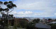 1/8 Lochner Street West Hobart TAS 7000 Lovely city views This light and bright one bedroom unit is situated on the top storey of this small complex of only four well maintained units. The unit comprises of separate loungeroom that leads through to the kitchen area that has plenty of storage and room for a small table and chairs, with lovely views of Hobart City. There is a good sized bedroom with built in robes . The bathroom has a shower over the bath and laundry fittings and a large linen cupboard to add to the storage already available. The unit also comes with a fridge and washing machine and a lock up garage. The gardens are maintained so your weekends are your own to sit back, relax and enjoy the views. (Sorry no pets) *** AVAILABLE NOW *** • To arrange an inspection of this property, please visit the Edwards Windsor website (ewre.com.au) and book online. • To view our entire catalogue of properties available for rent, or join our popular Renters Club, please visit our website (ewre.com.au), click on Residential Rentals and Properties for Lease. • You can also download a Tenancy Application Form or apply online via the Edwards Windsor website (ewre.com.au). *** EDWARDS WINDSOR ... show more General Features Property Type: Unit Bedrooms: 1 Bathrooms: 1 Bond: $800 Indoor Features Living Areas: 1 Toilets: 1 Outdoor Features Carport Spaces: 1 $200 per week