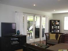 16 Elms Street Bundamba QLD 4304 ALL DECKED OUT ON 854SQM! Situated on a massive 854sqm block with easy rear yard access this spic and span family home presents to you with a you beaut front timber deck to relax and unwind on after the day’s events. With established tropical feel gardens screening for private easy living, this cracker of a property will steal your smiles in a heartbeat. As you step inside the fresh crisp renovations against polished timber flooring will sure impress you too. A sizeable lounge room opens up onto the front deck with large timber doors and the separate dining room is adjacent to the central kitchen which offers electric appliances. There are three bedrooms, two with built in wardrobes. The main bathroom is tiled and complete with a shower over bath arrangement. There is a rear deck also which overlooks the expansive rear yard with ample space to build that big shed you’ve always wanted, or simply enjoy for the kids and pets. Currently tenanted for $270 per week until February 2015 to the world’s best tenants – don’t delay your inspections on this one! General Features Property Type: House Bedrooms: 3 Bathrooms: 1 Land Size: 854 m² (approx) Indoor Features Air Conditioning Outdoor Features Carport Spaces: 1 Deck Fully Fenced