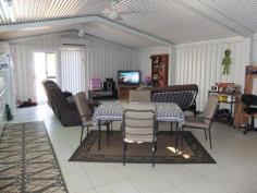 20 Schmidt St Tennant Creek NT 0860 $419,000
Your family will be happy with this enormous block of 1517sqm and all
that is on offer. With an elevated three bedroom home to the front and
additional self-contained accommodation to the rear, there is
versatility form most family dynamics. The home has been
renovated over time with attractive corrugated iron cladding on the
exterior. Inside we find timber flooring throughout the living areas and
bedrooms. The refurbished kitchen overlooks the rear yard and offers
abundant natural light. All bedrooms feature split systems, built in
robes, fans and blinds. A large carport for three vehicles is well
positioned separating the house and flat. The home is currently rented
to NT Housing at $425 per week until January 2015. The real gem
in this purchase is the spacious 72sqm flat. The huge verandah provides a
great entertaining area for a barbecue or party. The open plan living,
dining and impressive kitchen is tiled and made comfortable with high
ceilings, fans and tiling. A split system and insulation ensure all year
round comfort. The bedroom is separate and comes with built in robes
and access to the verandah. The external ensuite is a classic with
shower and toilet available. Veggie patch and plenty of storage complete
the picture. The dwellings are supported by individual electrical meters which eliminates any difficulties. Front
and rear access, fences, gates and established low maintenance gardens
surround this sanctuary, perfect for private and secure living. Plenty
of space is still available for a pool and shed. This appealing
property is perfect for the owner occupier or investor who could live in
the unit and lease the home. To top this package off the property is in
an excellent location, close to parks, shops and schools.