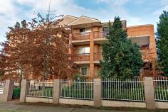 1/80 - 88 Cardigan Street Guildford NSW 2161 Immaculate ground floor 2 bedroom unit located only a stone's throw away from the Station, Shopping Centre and all other amenities in a security complex offering open floor plan with L shaped lounge & dining opening onto a large balcony, spacious polyurethane kitchen with granite bench top and gas cooktop, 2 good sized bedrooms, main with built-in & 2nd balcony, bathroom with spa bath, laundry with 2nd toilet and a fully secured lock up garage. MOVE RIGHT IN & PUT YOUR FEET UP.