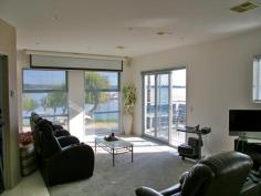 1/85 River Road Yarrawonga VIC 3730 Waterfront perfection with stunning views of Lake Mulwala Unique double storey home of approx 34 squares featuring 4 bedrooms, 3 bathrooms, 2 granite kitchens, theatre with 3500mm electric screen, european appliances, 2 sunny outdoor living areas, CBUS electricals, integrated sound system, alarm system & double garage/workshop. Opposite Yacht club and boat ramp. Boat lovers dream! General Features Property Type: House Bedrooms: 4 Bathrooms: 3 Outdoor Features Garage Spaces: 2