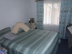 8 Railway Parade Injune QLD 4454 $270,000 Neg. Lowset 3 bedroom home in a thriving small town.Open Plan living area opening onto front verandah. Lounge has reverse cycle air-conditioning, fan & wood heater. Kitchen has electric stove, dishwasher & rangewood. Main bedroom is carpeted, built-ins and ceiling fan. Main bathroom has shower, toilet and another separate toilet. Laundry with linen cupboards. Access to 2 car garage from house! Side verandah with ramp. Huge outdoor area at rear of house with established gardens and palm trees. House is connected to 2 x 13600 Rain Water tanks as well as town water. 8x8 metre steel shed with cemented floors at rear of house with single three phase power. Tenure Type: Leasehold $800 yearly. Read more at http://roma.ljhooker.com.au/C8HG2#21cyxwuFbI1Flcbi.99