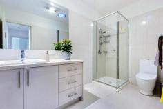 2/386 Station Street Box Hill South VIC 3128 Space & Luxury Unite in this Young Residence At just 4 years young, this luxurious 2-storey family residence is a dream for families and investors desiring space, style and top quality appointments. From this premier location, you're close to Box Hill Central and walking distance from local shops, supermarket, transport, Kingswood College and Roberts McCubbin Primary. Privately nestled back from the road in a boutique block of just two, you'll love the sleek, contemporary finishes from the stacked stone feature entry, expansive hallway and CaesarStone benchtops, to the timber floors, high ceilings, timber staircase and fashionable window furnishings. Downstairs you'll find a master suite featuring a vogue 2-way ensuite and lush garden views. A large study/5th bedroom and a powder room are also downstairs. Upstairs are 3 double bedrooms (double fitted BIRS), a deluxe family bathroom and handy powder room/4th toilet. You'll enjoy hosting parties in the beautiful Chef's kitchen showcasing CaesarStone benchtops, s/s Euro appliances, s/s Bosch dishwasher and excellent storage. A huge family/meals room and a rumpus/games room ensures effortless family living and entertaining. It's all made perfect with a private alfresco area. General Features Property Type: Townhouse Bedrooms: 5 Bathrooms: 2 Indoor Features Toilets: 4 Alarm System Intercom Floorboards Dishwasher Gas Heating Split-system Air Conditioning Evaporative Cooling Ducted Heating Air Conditioning Outdoor Features Carport Spaces: 1 Garage Spaces: 1 Courtyard Other Features Air Conditioning, Alarm System, Curtain/Blinds, Dishwasher, Fixed Floor Coverings, Light Fittings