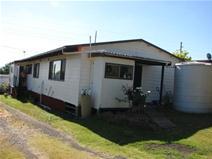 52 Mount Street, Aberdeen NSW 2336 This Residence or suite of units offers the bonus of a living in premises and a rented Two (2x) Bedroom flat. The property could serve and investor as two Flats ( 1 x 3 B/r plus 1 x 2 B/r) or someone could owner occupy the front 3 Bedroom home and collect rent on the Two Bedroom at the rear. The current owner does just that ! It comprises 1/52 Mount Street as a three bedroom home with Lounge room (Split Air), Tidy bathroom, Kitchen, (all electric) Meals dining area, sun deck porch and a great big 7 mtr double garage workshop plus twin carports. It's a mammoth shed and there's plenty of access. The back suite has Two Bedroom with a generous day room, Kitchen, Tiled bathroom and laundry. The gross rent potential for these flats would be around $20,000 plus per year. The entire property on a 1011 sqm lot all one Torrens title deed. Excellent investment or look after your retirement Sell at $280,000. more details visit www.ehpfirst.com.au