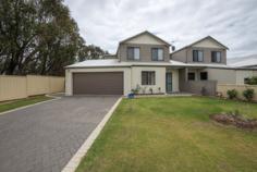 This stunning home is spacious and set on a very easy care block giving you time to enjoy life instead of being a slave to your yard! Entrance from the spacious double lockup garage, takes you into the downstairs living area of the home, with easy care floor tiles.... Well equipped kitchen boasts stainless steel appliances, dishwasher recess, fully tiled sp[lash backs through the entire kitchen and overhead cupboards to give you more storage The meals and family area lead through sliding door out to the rear courtyard, which is a lot bigger than most! Downstairs the theatre room, could also double as an extra bedroom if you need it! Upstairs another central living area with the bedrooms all coming off..... The huge main bedroom has both built in and walk in robe, ensuite and a balcony too The other bedrooms are also a decent size with robes to 2 of them.... The location is so convenient with the Farmers market just across the road and more than easy access into Bunbury or to Eaton from the bypass road.... An easy care low maintenance property at just 7 years old, with auto reticulation and added protection of Alarm system as well