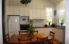17 William St Millmerran QLD 4357 DETAILS $315,000 Residential Bedrooms: 4 Bathrooms: 2 Garage Spaces: 1 1st Time Opportunity—”The Post Office House” Available For Separate Sale – $315 000 Area: 1010 Square Metres – Renovated Queenslander with character and charm, 4 Bedroom timber home, all b/rs with ceiling fans & built-in storage, main b/r has ensuite & opens onto verandah, 2nd b/r has large w.i.r.. Large formal lounge room with fire place & ceiling fan, stylish main bathroom with shower over bath, toilet & vanity, wide hallway, wide polished original timber floorboards throughout, office, laundry with plenty of storage space, front verandah with northern aspect, single garage, under cover outdoor living area, cubby house, garden shed, established gardens, fenced yard. Only minutes to walk to the Main Street & all town amenities. Backyard access to Bowls Club